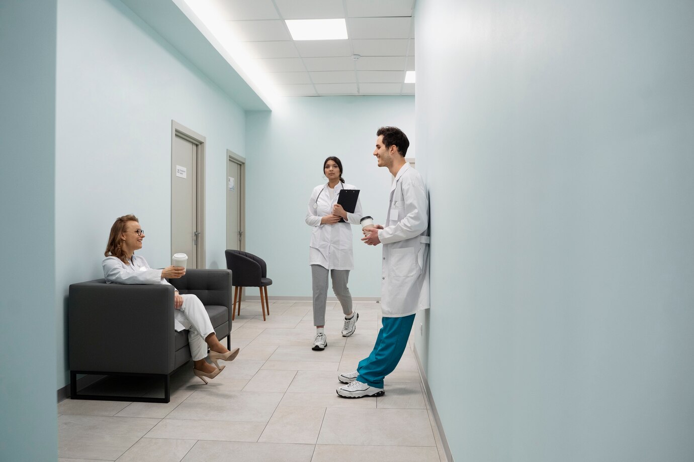 A modern walk-in clinic with a bright sign on the Las Vegas Strip, featuring a welcoming entrance and healthcare staff assisting patients.