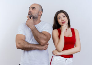 Thoughtful couple considering what to do after possible STD exposure.