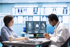 Doctor reviewing AI-enhanced ultrasound images on digital screen in modern medical clinic